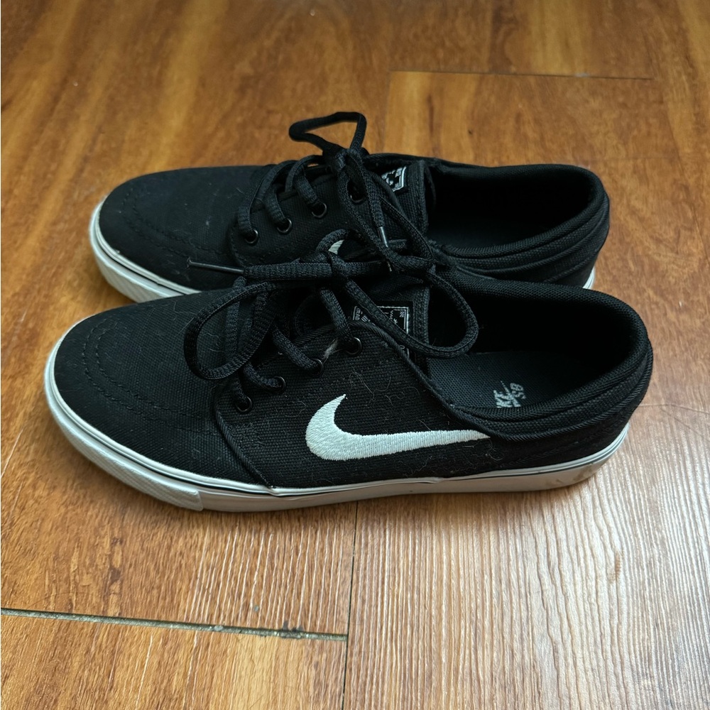 Black Sneakers with White Accents